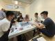 忽悠旅社團隊與金門村復會及金門在地青年一同測試桌遊，希望優化桌遊的可玩性