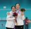 （附件照片3）我國選手洪筱晴(左)及張緻如(右)在亞運滑輪溜冰花式溜冰女子個人獲得金牌及銅牌，於頒獎台上合影。